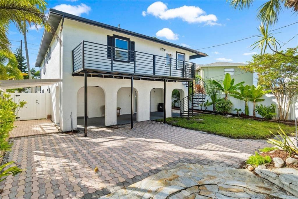 307 161st Avenue Redington Beach, FL 33708 - Photo 31 of 41 a view of a house with a patio