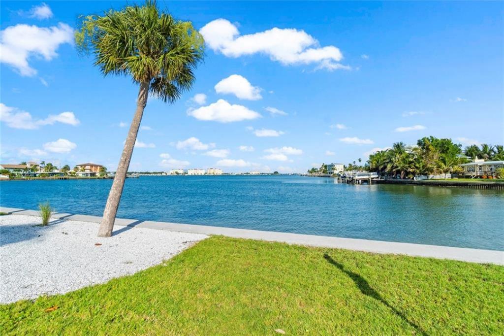 307 161st Avenue Redington Beach, FL 33708 - Photo 34 of 41 a view of a lake with a yard