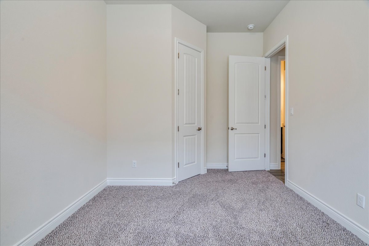 124 Compass Lane Kyle, TX 78640 - Photo 24 of 38 a view of an empty room