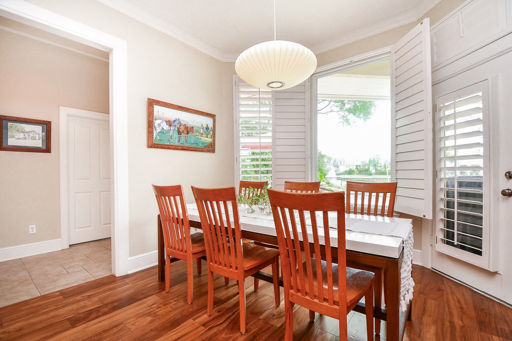 12711 Waterside Way Houston, TX 77041 - Photo 20 of 48 Breakfast area with pool and lake view.