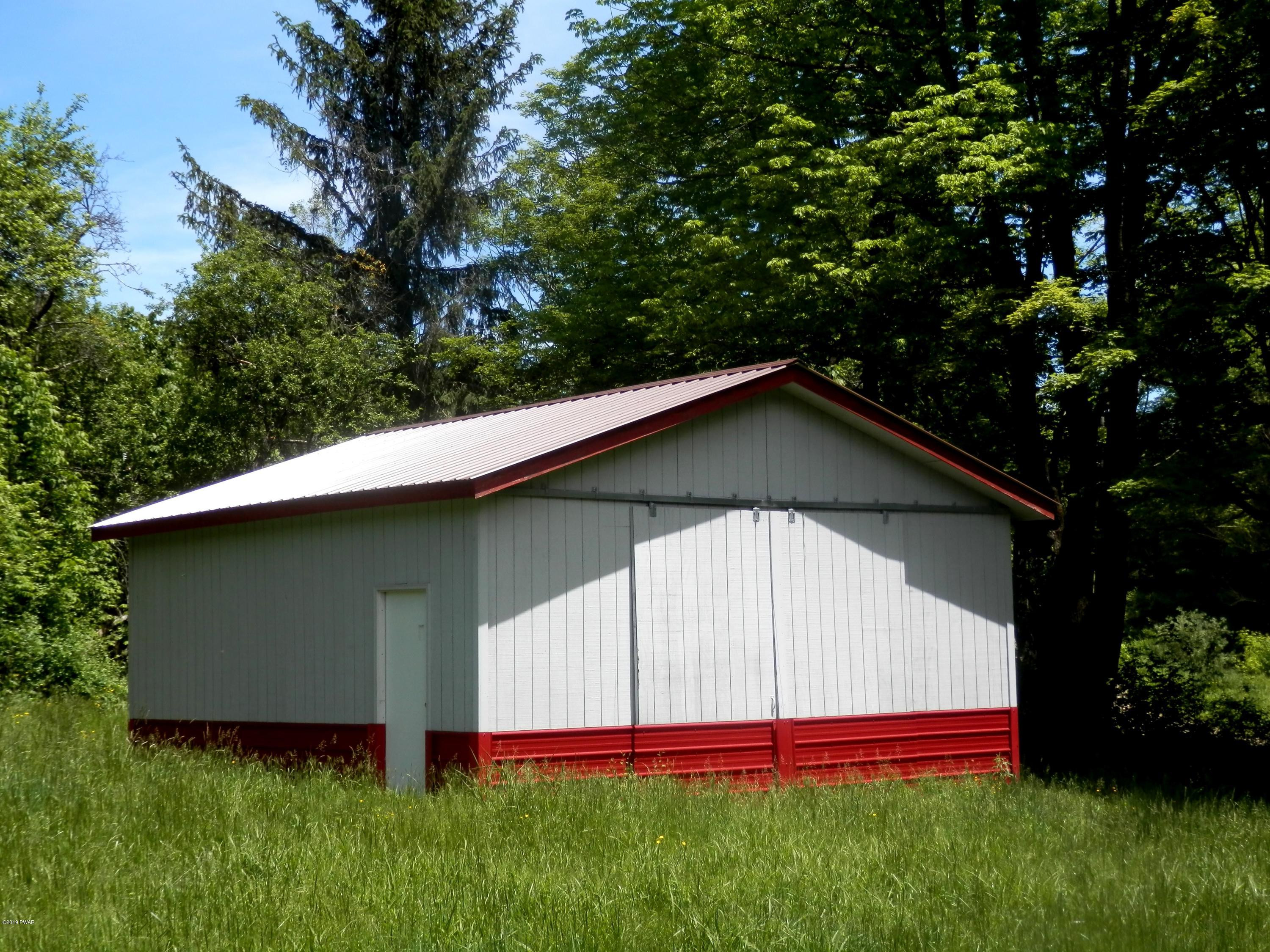 323 Daw Road Pleasant Mount, PA 18453 - Photo 4 of 18 Huge 2 car garage/pole building
