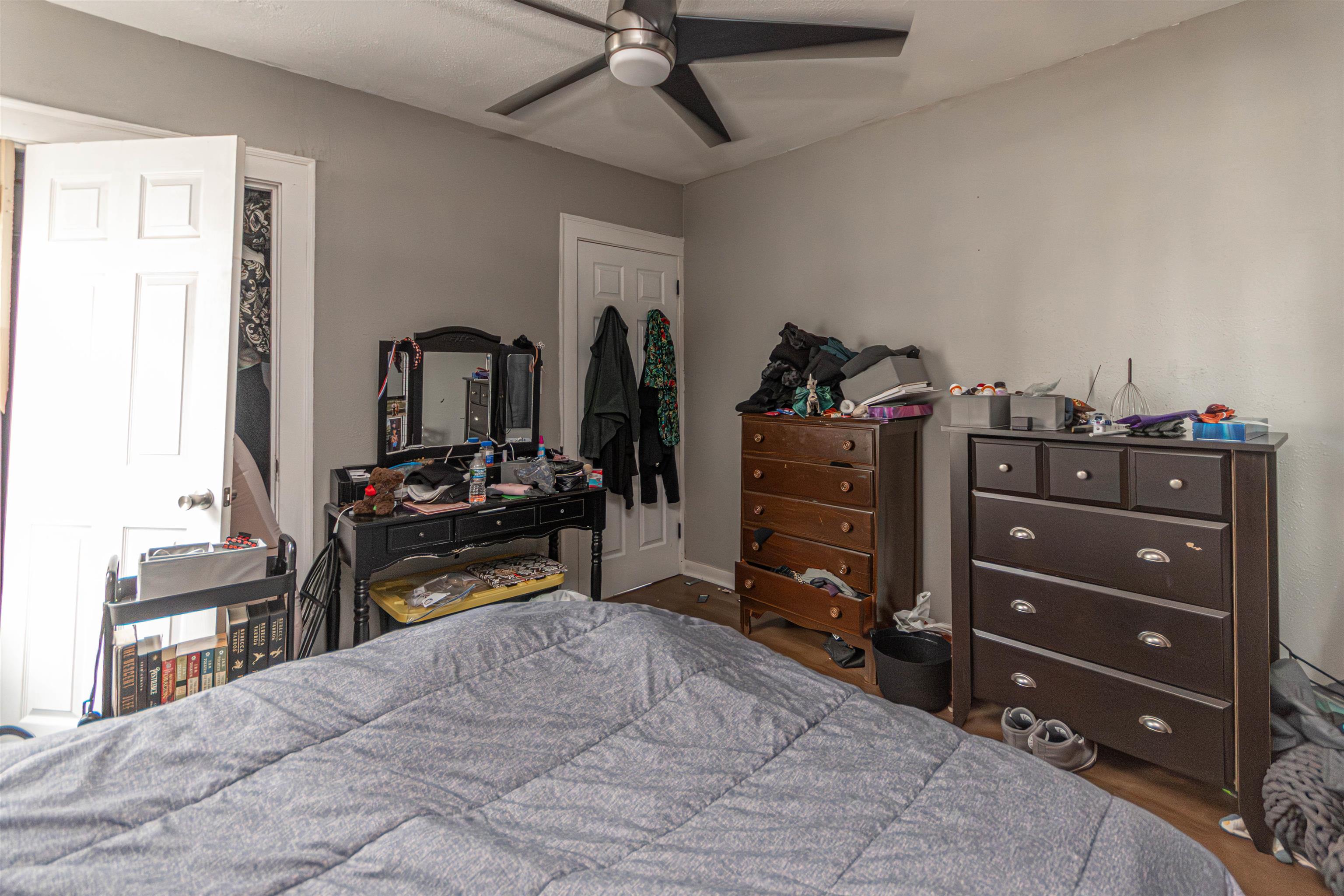 2827 Knight Avenue Rockford, IL 61101 - Photo 13 of 16 a bed room with a bed and a television
