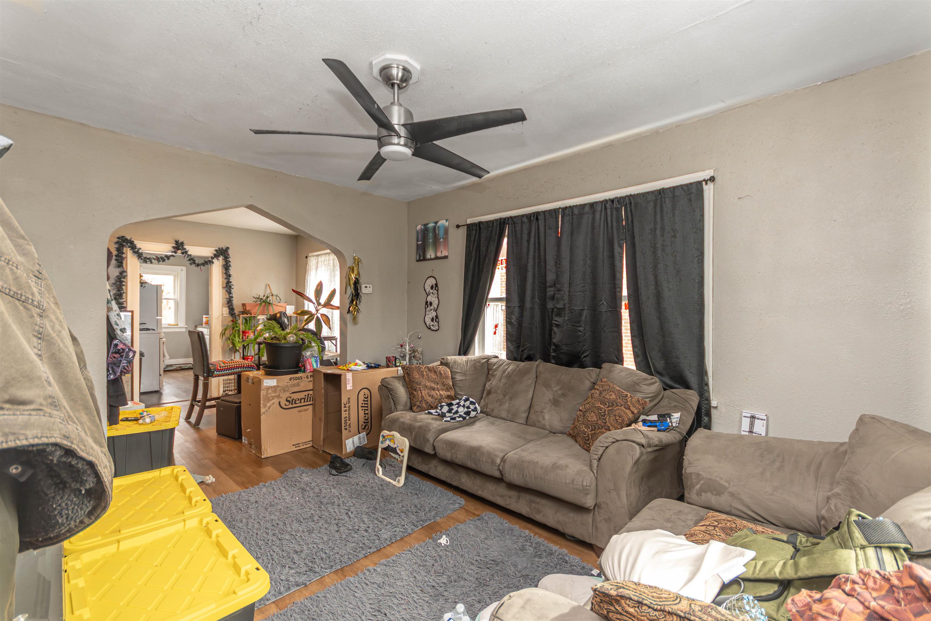 2827 Knight Avenue Rockford, IL 61101 - Photo 3 of 16 a living room with furniture and a large window