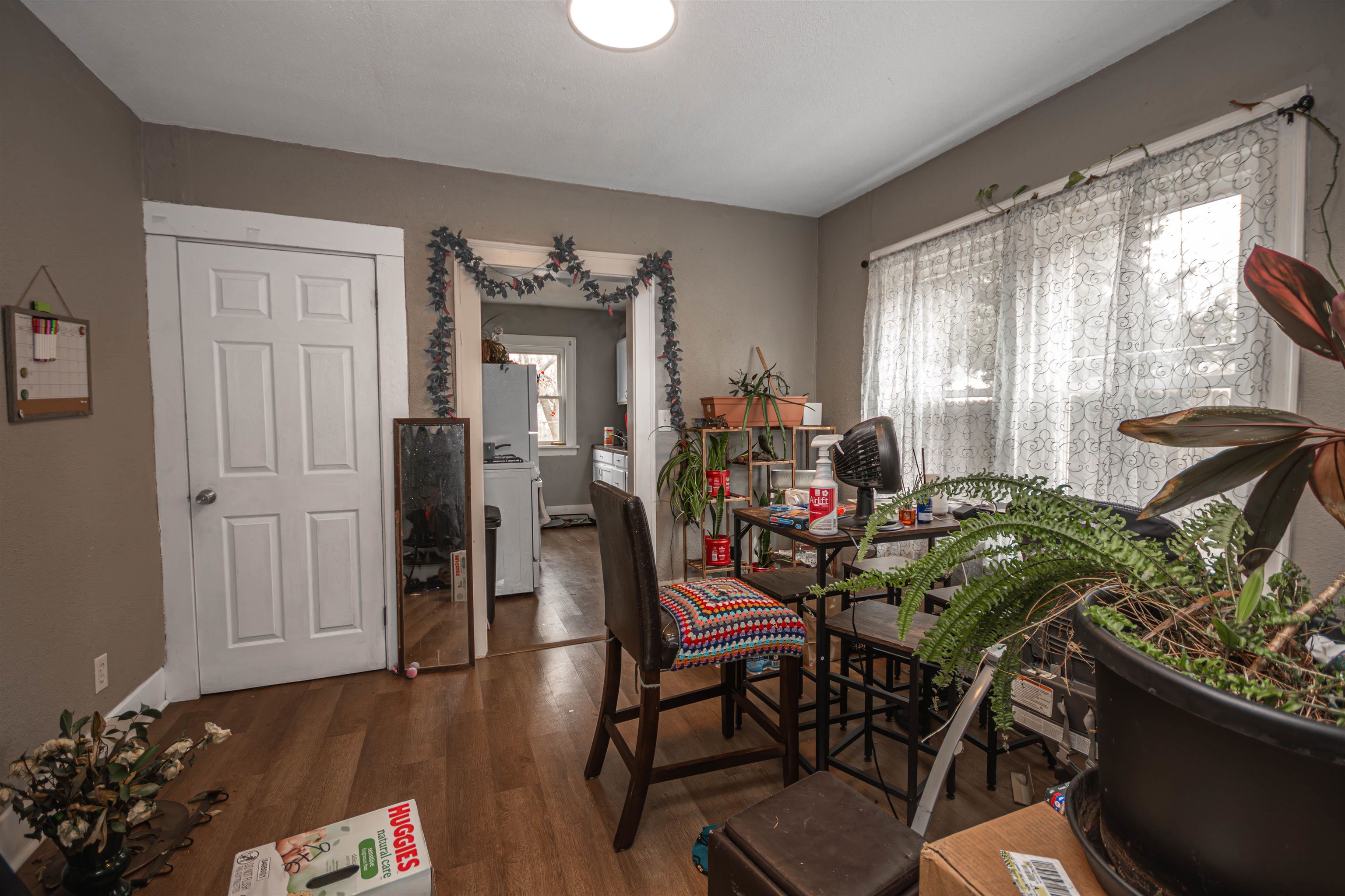 2827 Knight Avenue Rockford, IL 61101 - Photo 5 of 16 a view of a dining room with furniture window and wooden floor