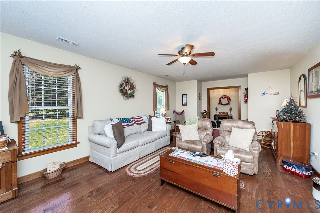 2081 Mill Road Henrico, VA 23231 - Photo 11 of 30 a living room with furniture ceiling fan and a window
