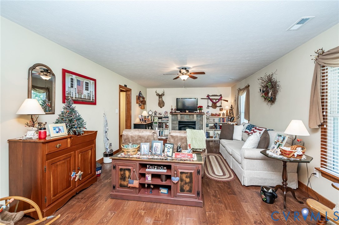 2081 Mill Road Henrico, VA 23231 - Photo 13 of 30 a living room with furniture and wooden floor