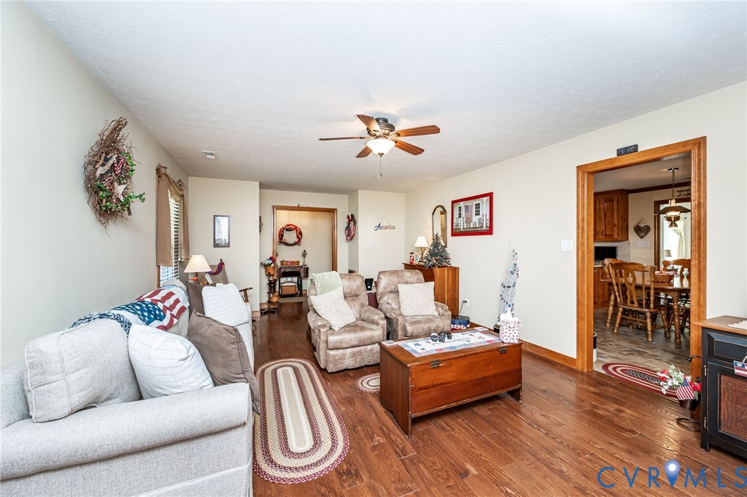 2081 Mill Road Henrico, VA 23231 - Photo 15 of 30 a living room with furniture and wooden floor