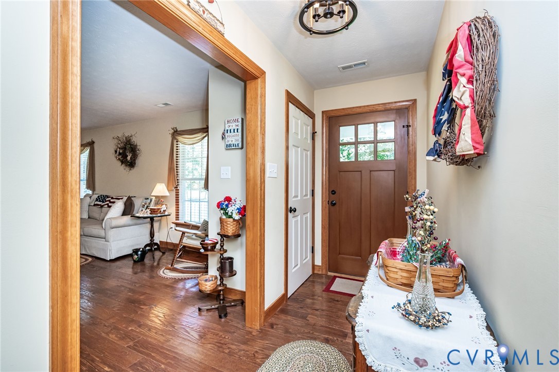 2081 Mill Road Henrico, VA 23231 - Photo 16 of 30 a living room with furniture and a wooden floor