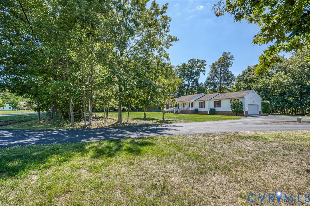 2081 Mill Road Henrico, VA 23231 - Photo 29 of 30 a view of a swimming pool with a yard