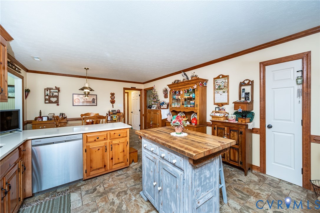 2081 Mill Road Henrico, VA 23231 - Photo 10 of 30 a kitchen with granite countertop a sink stove and refrigerator