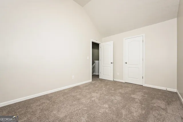 an empty room with an entryway