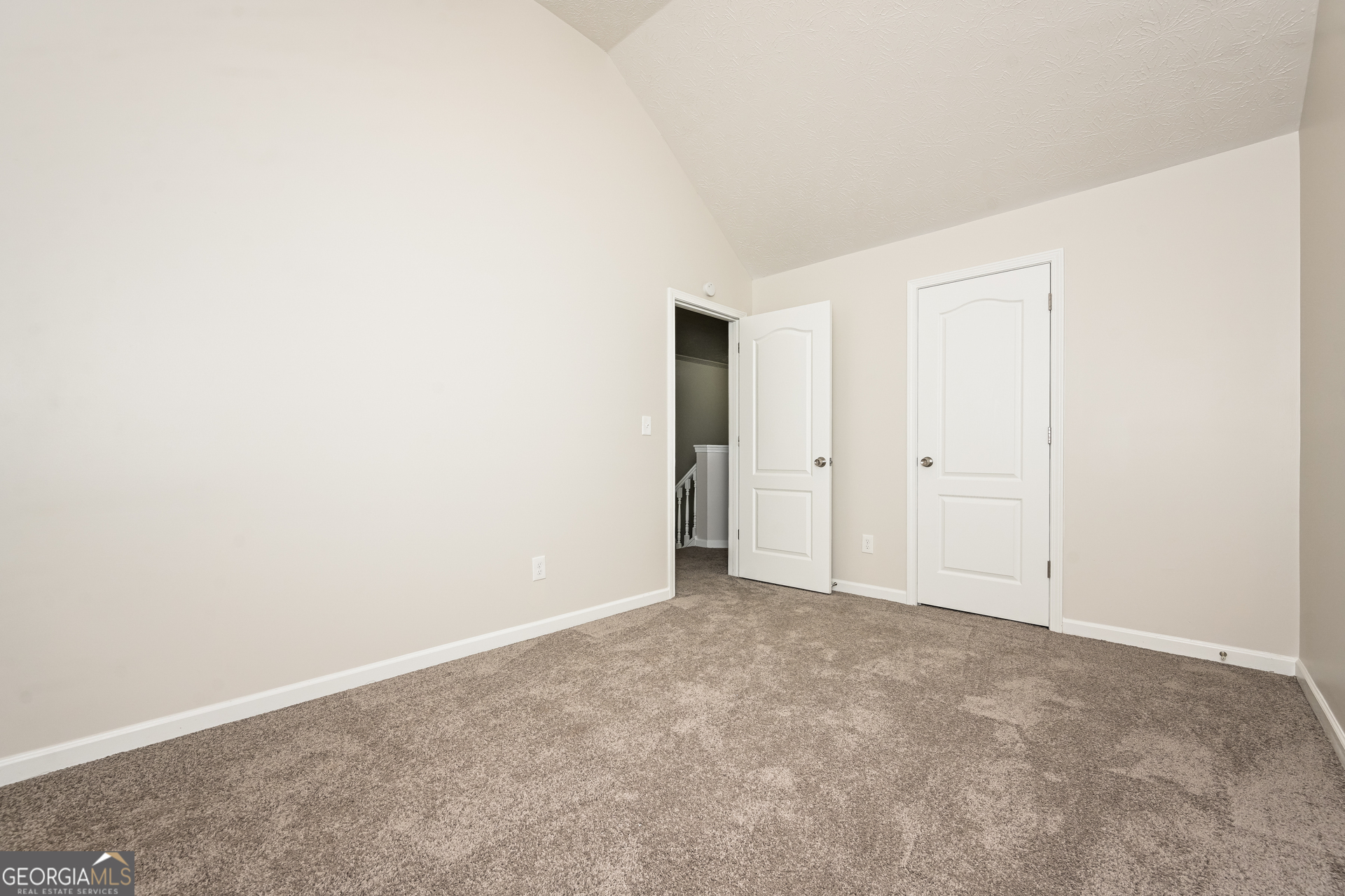4392 Chester Lane Ellenwood, GA 30294 - Photo 14 of 17 an empty room with an entryway