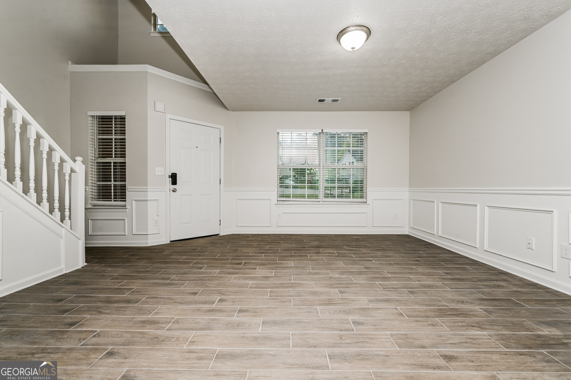 4392 Chester Lane Ellenwood, GA 30294 - Photo 5 of 17 a view of an empty room with a window