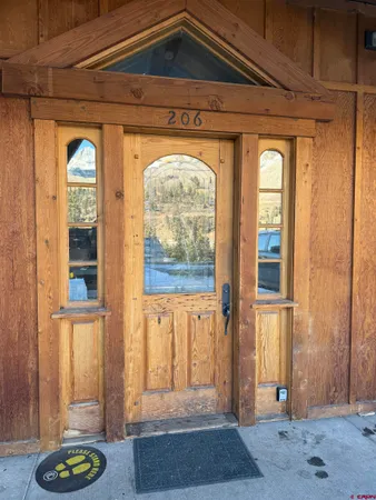 a view of a door and a window