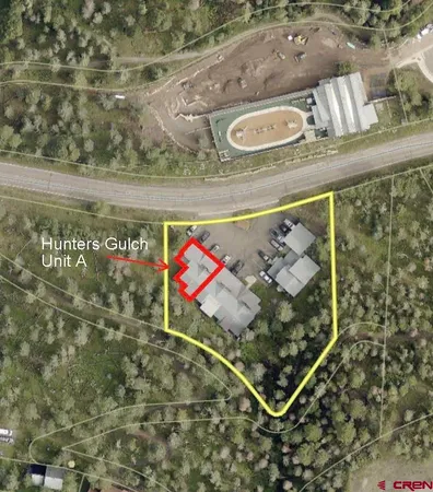 an outdoor space with wooden floor