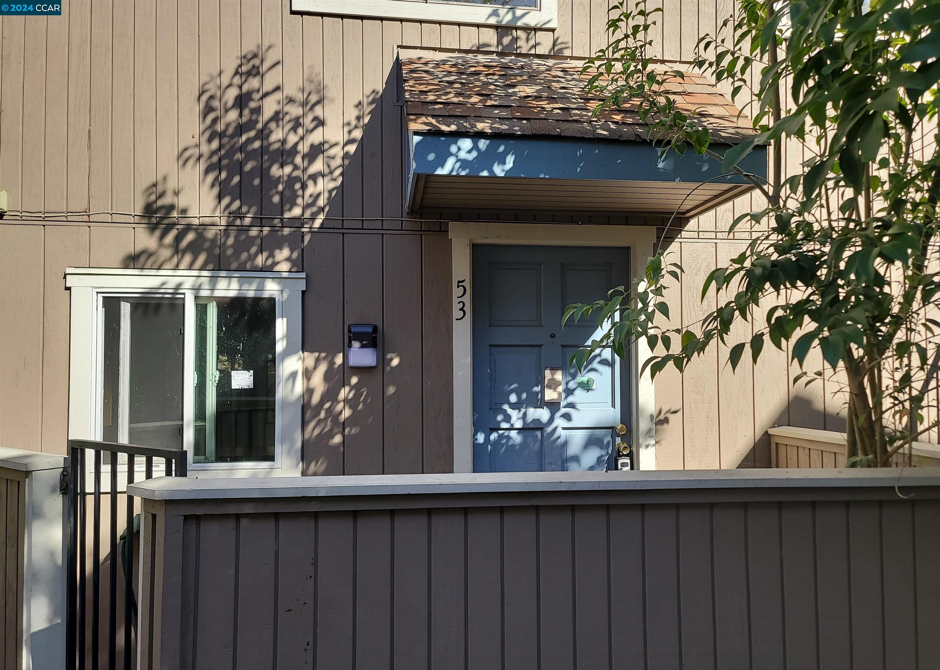 3901 Clayton Road, Unit 53 Concord, CA 94521 - Photo 1 of 1 a view of a house with a tree