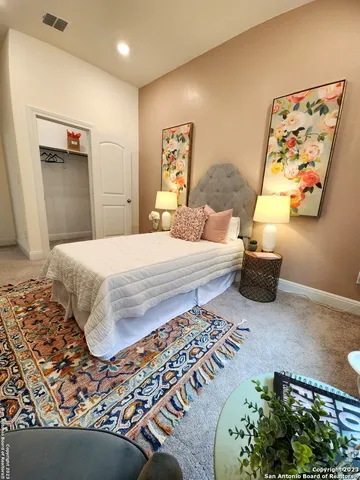 a view of livingroom with hardwood floor and a ceiling fan