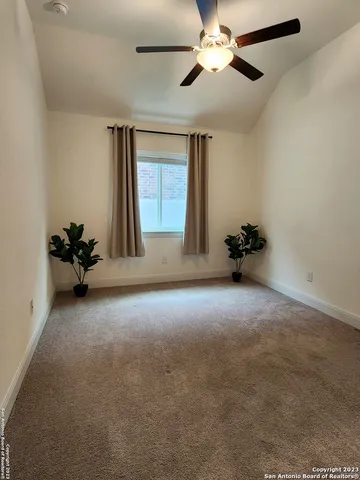 a bathroom with a toilet a sink a mirror a bathtub and shower