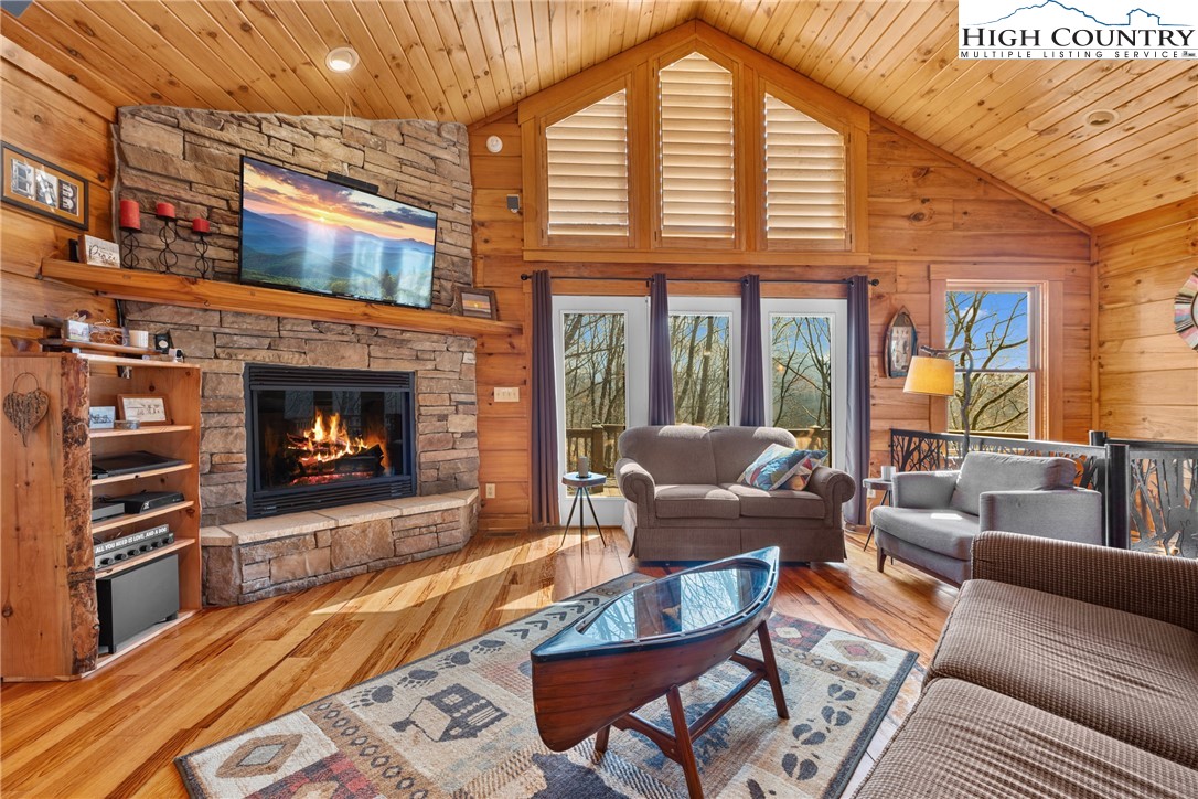 217 Rainbow Ridge Road Zionville, NC 28698 - Photo 13 of 46 a living room with fireplace furniture and a fireplace