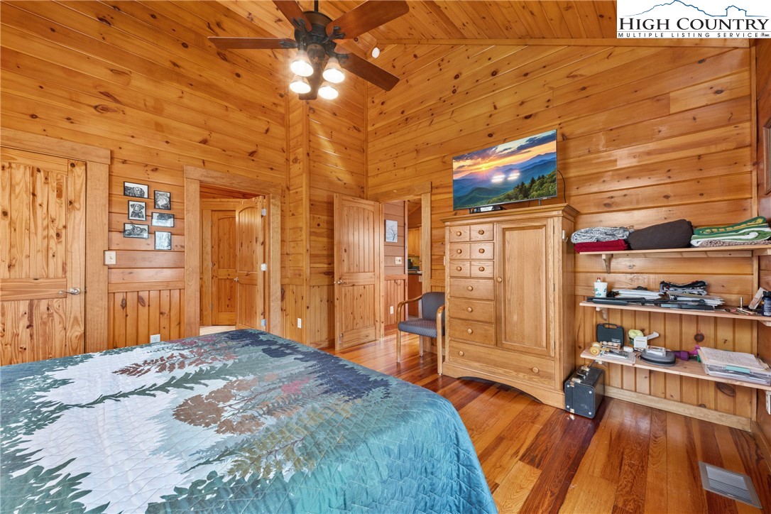 217 Rainbow Ridge Road Zionville, NC 28698 - Photo 24 of 46 a bedroom with a bed and a view of walk in closet