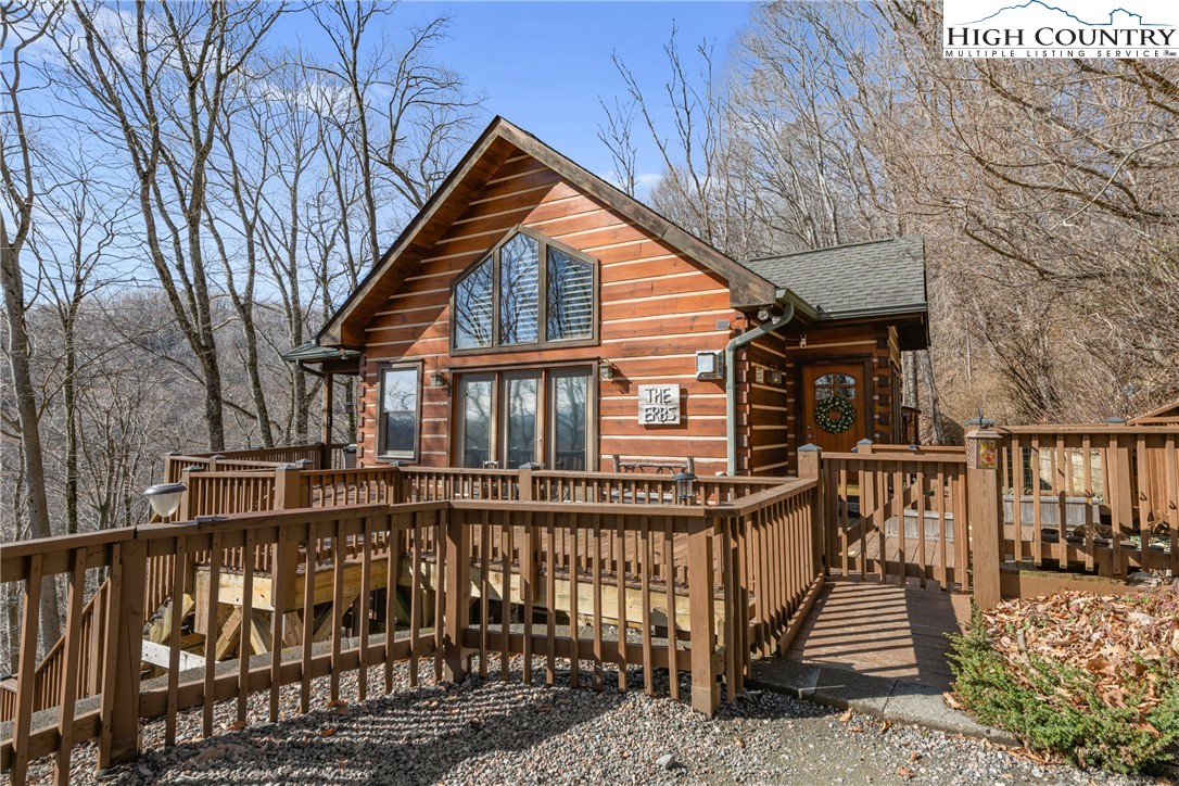 217 Rainbow Ridge Road Zionville, NC 28698 - Photo 3 of 46 a view of a house with backyard and deck