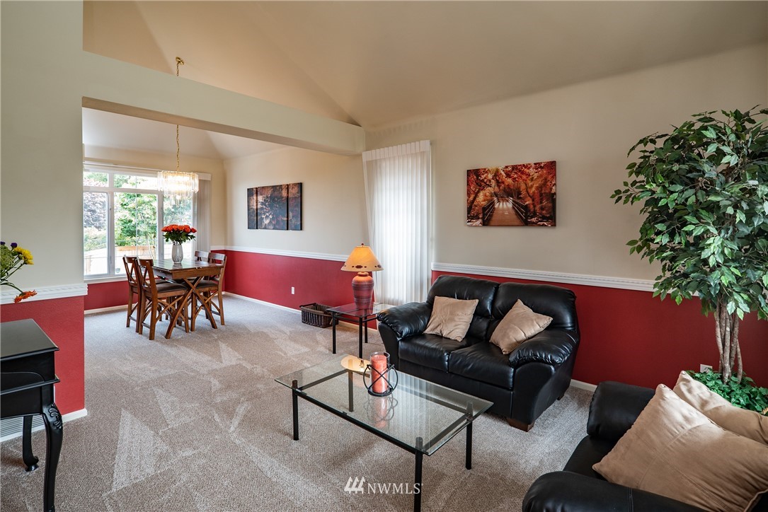 2825 202nd Street Southeast Bothell, WA 98012 - Photo 4 of 24 a living room with furniture and a potted plant