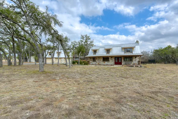 a view of house with outdoor space