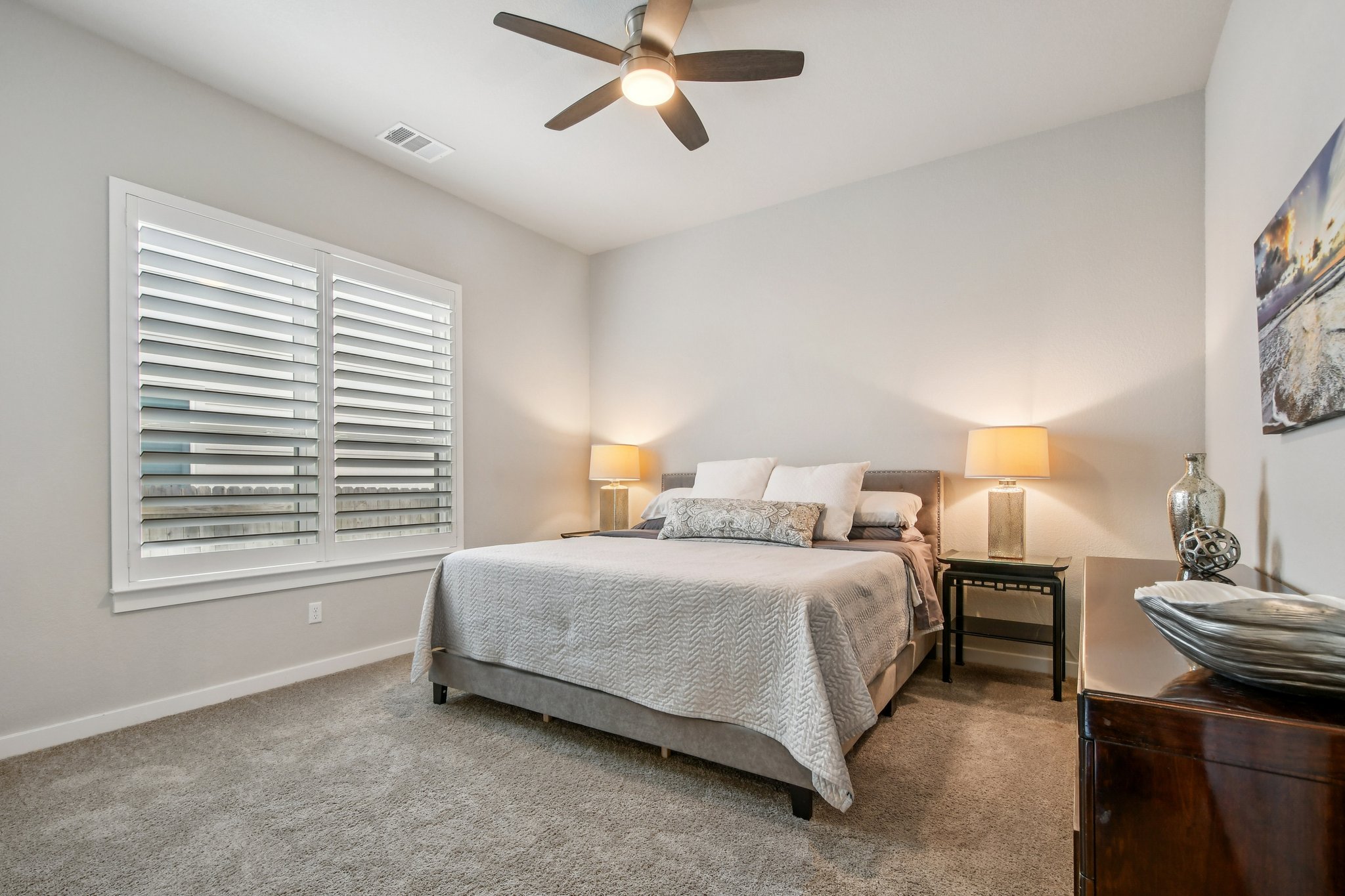 520 Hazy Hills Loop Dripping Springs, TX 78620 - Photo 14 of 27 In addition to the primary suite, the first floor includes two generous secondary bedrooms. These meticulously maintained bedrooms are perfect for accommodating family members or overnight guests.