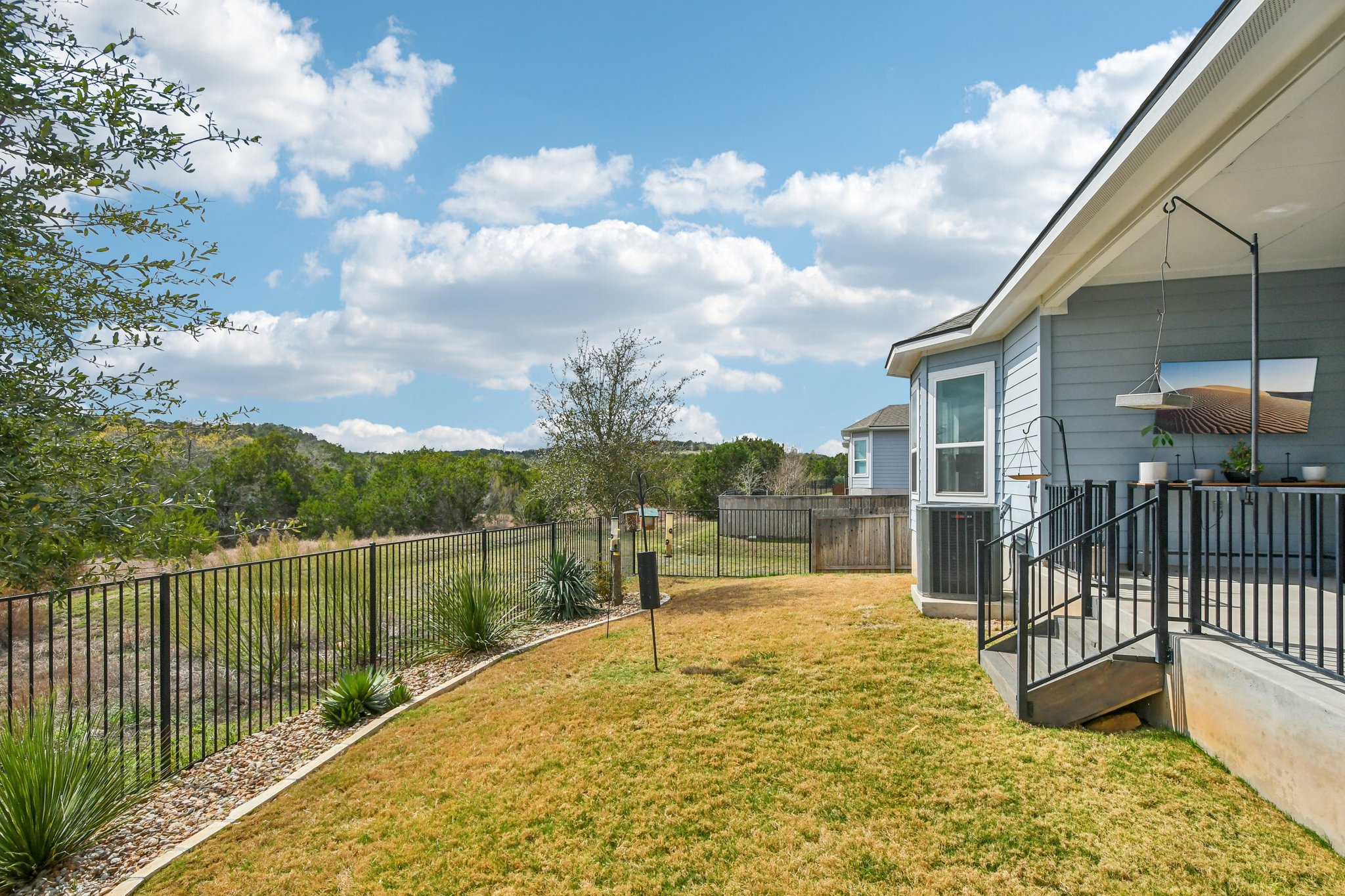 520 Hazy Hills Loop Dripping Springs, TX 78620 - Photo 20 of 27 Backyard over the the greenbelt.