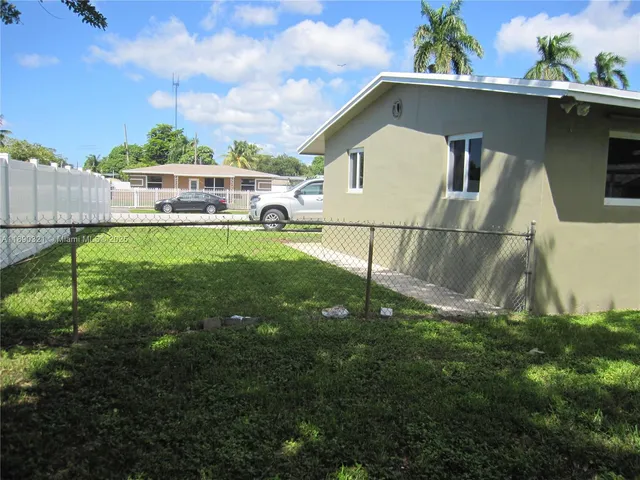 a house view with a garden space