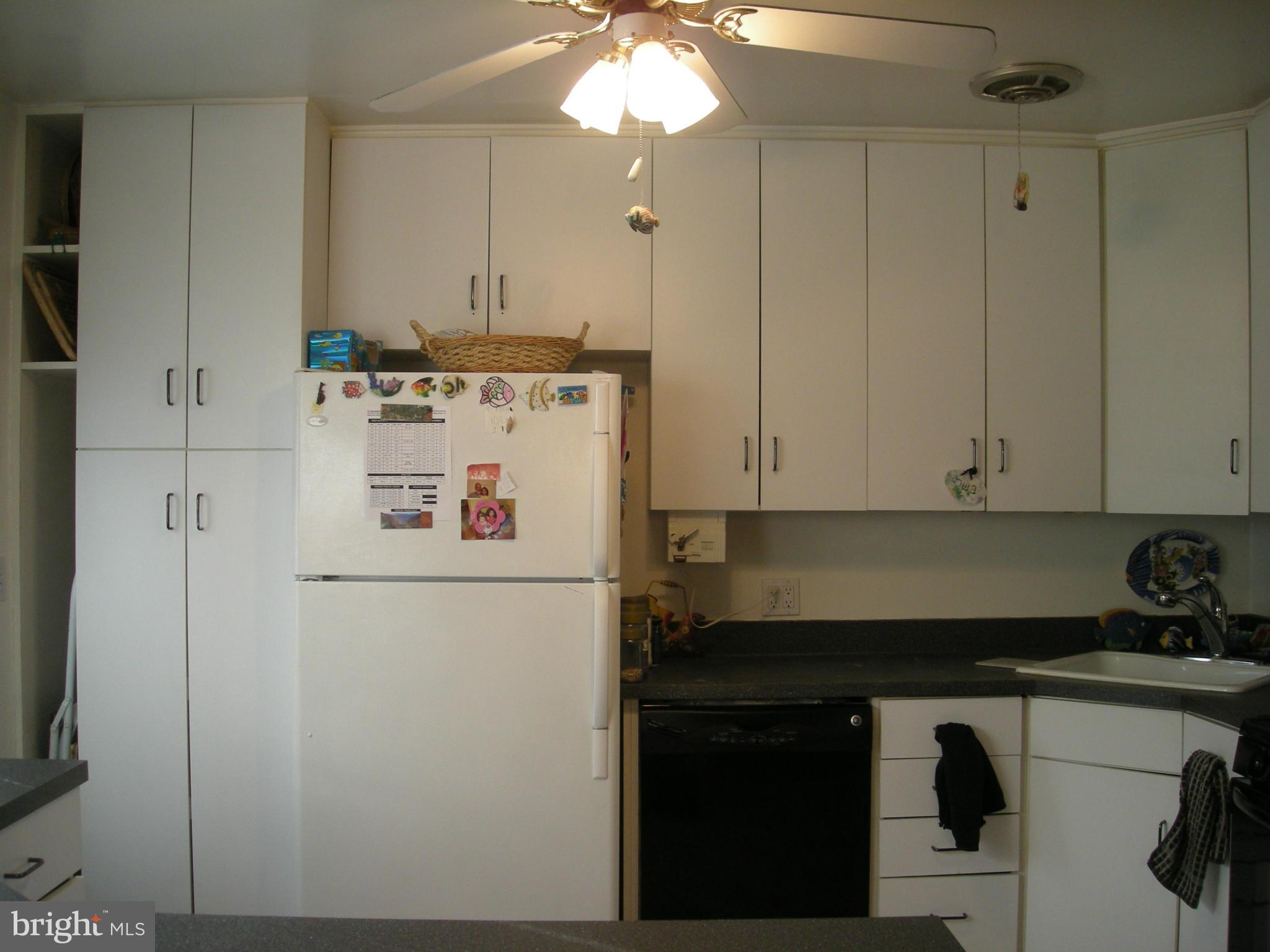 3209 Nerak Road Baltimore, MD 21208 - Photo 11 of 15 a utility room with closet dryer and washer