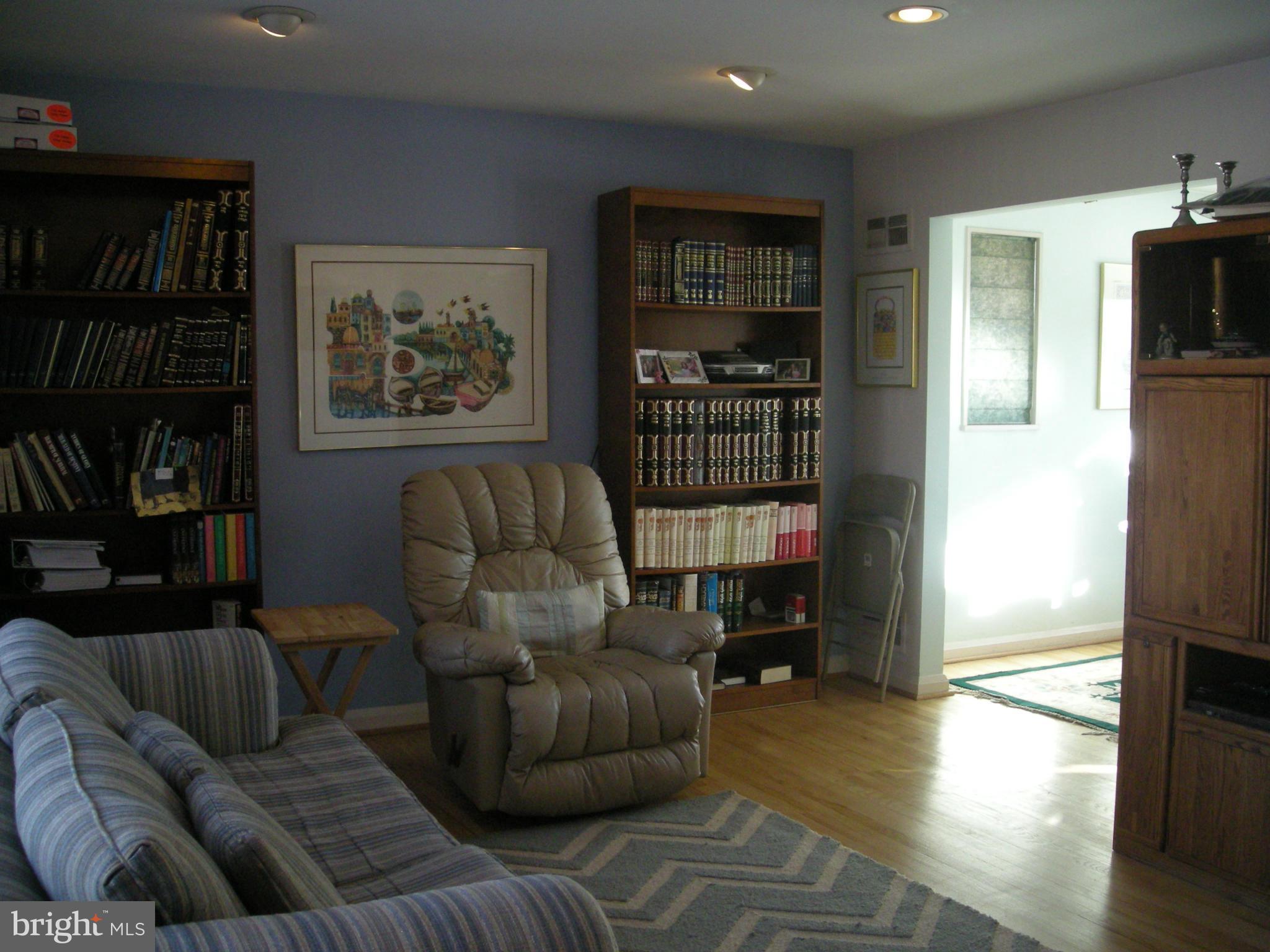 3209 Nerak Road Baltimore, MD 21208 - Photo 3 of 15 a living room with furniture and a walk in closet