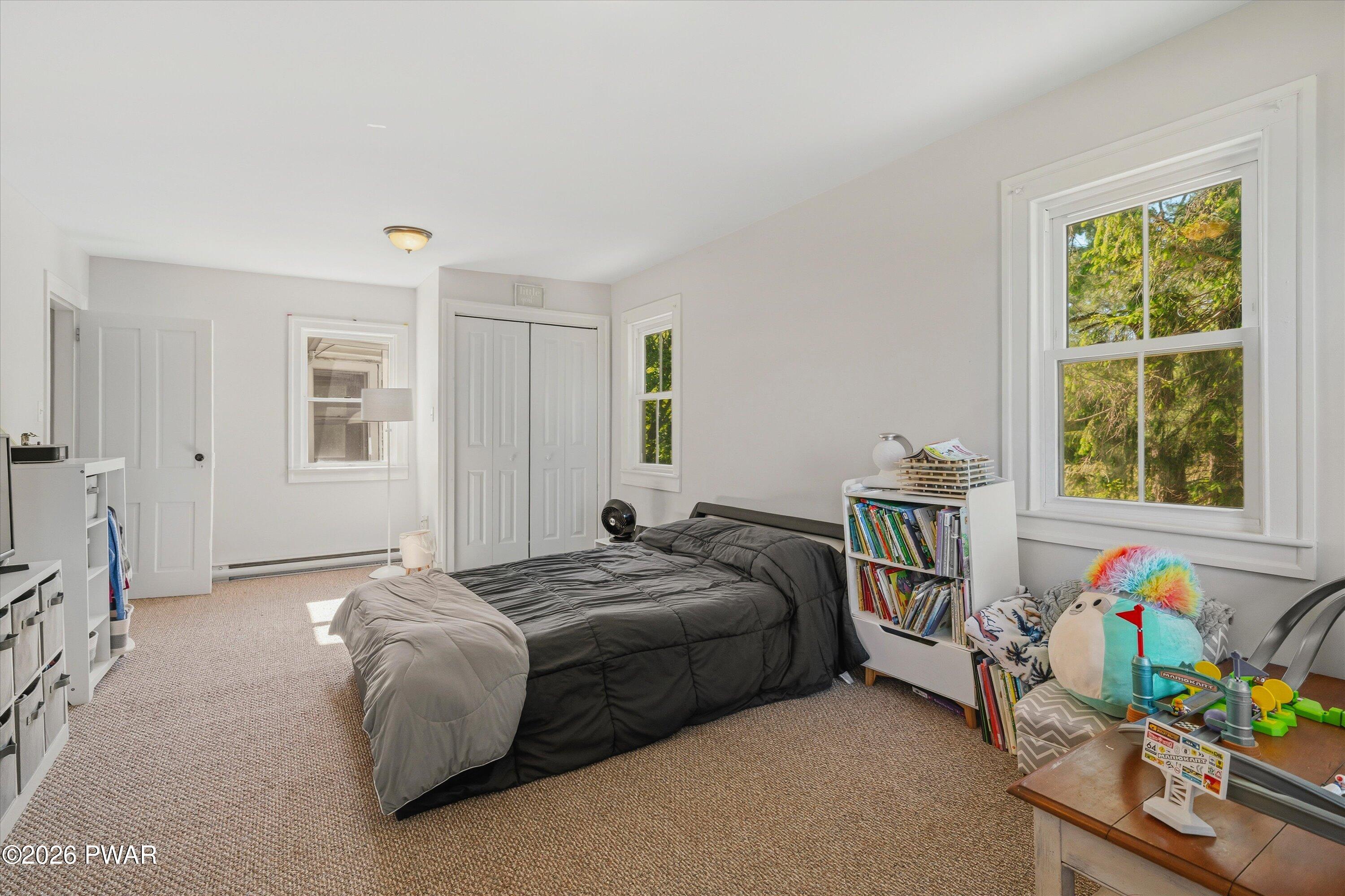 127 Valleyview Road Greentown, PA 18426 - Photo 43 of 66 a bedroom with a bed and a window