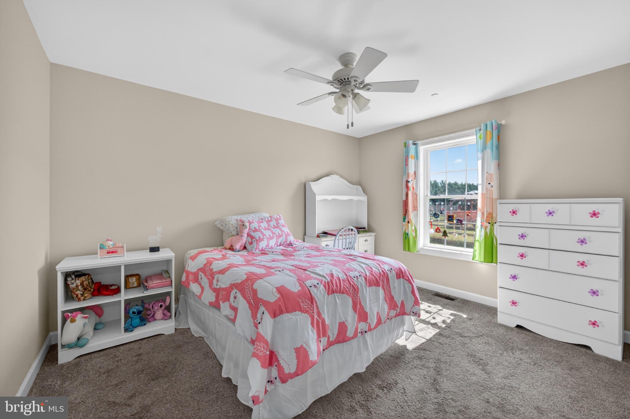 23283 Magnolia Hills Road Denton, MD 21629 - Photo 36 of 54 a bedroom with a bed and a closet