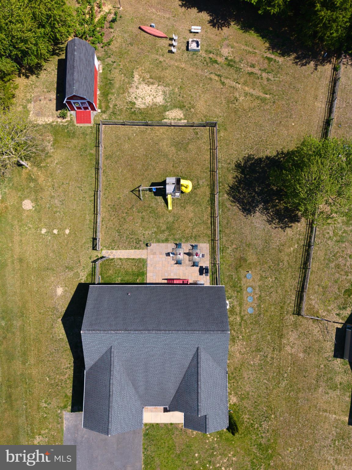23283 Magnolia Hills Road Denton, MD 21629 - Photo 5 of 54 a aerial view of a house with a yard