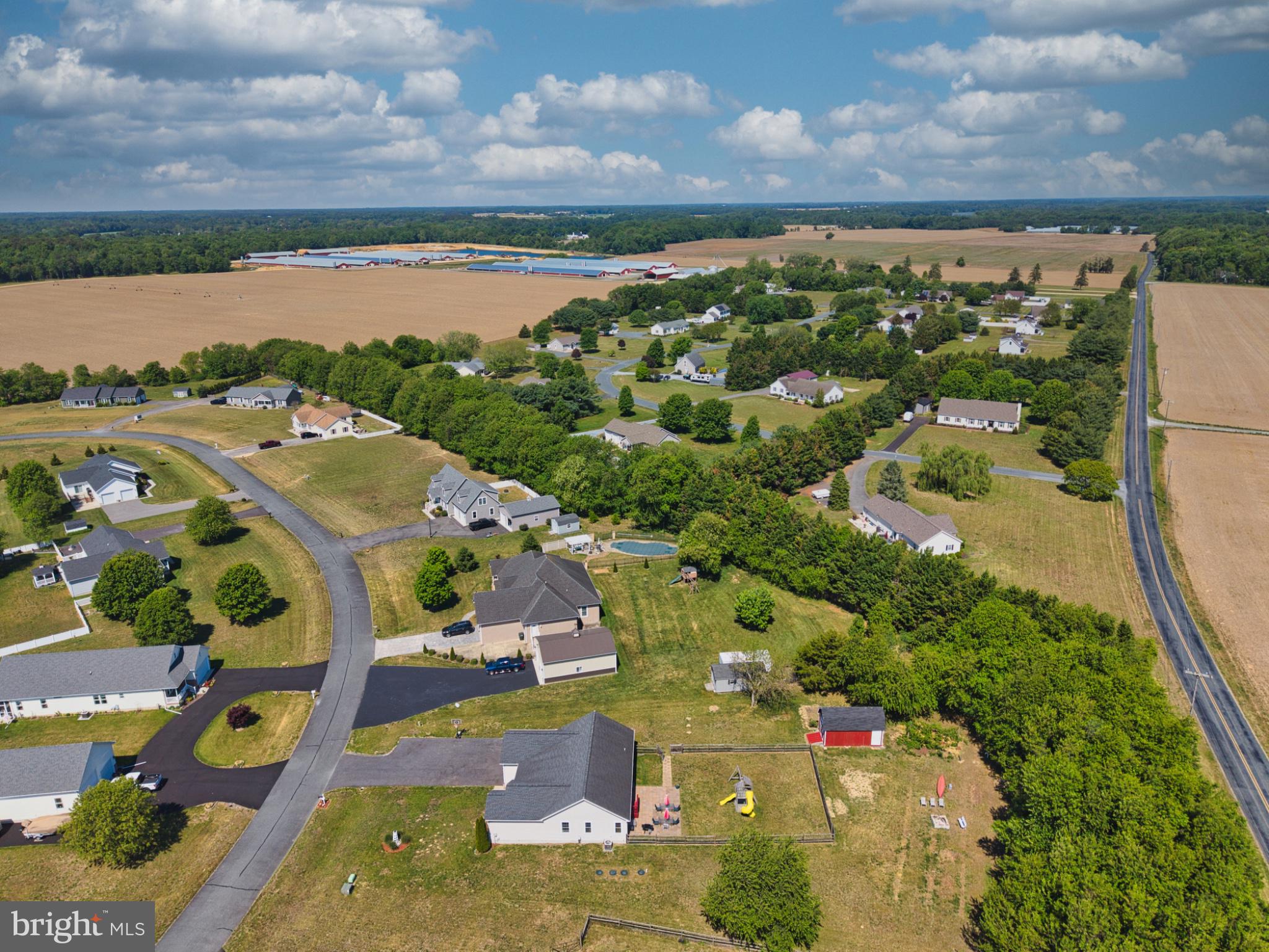 23283 Magnolia Hills Road Denton, MD 21629 - Photo 51 of 54 an aerial view of residential houses with outdoor space