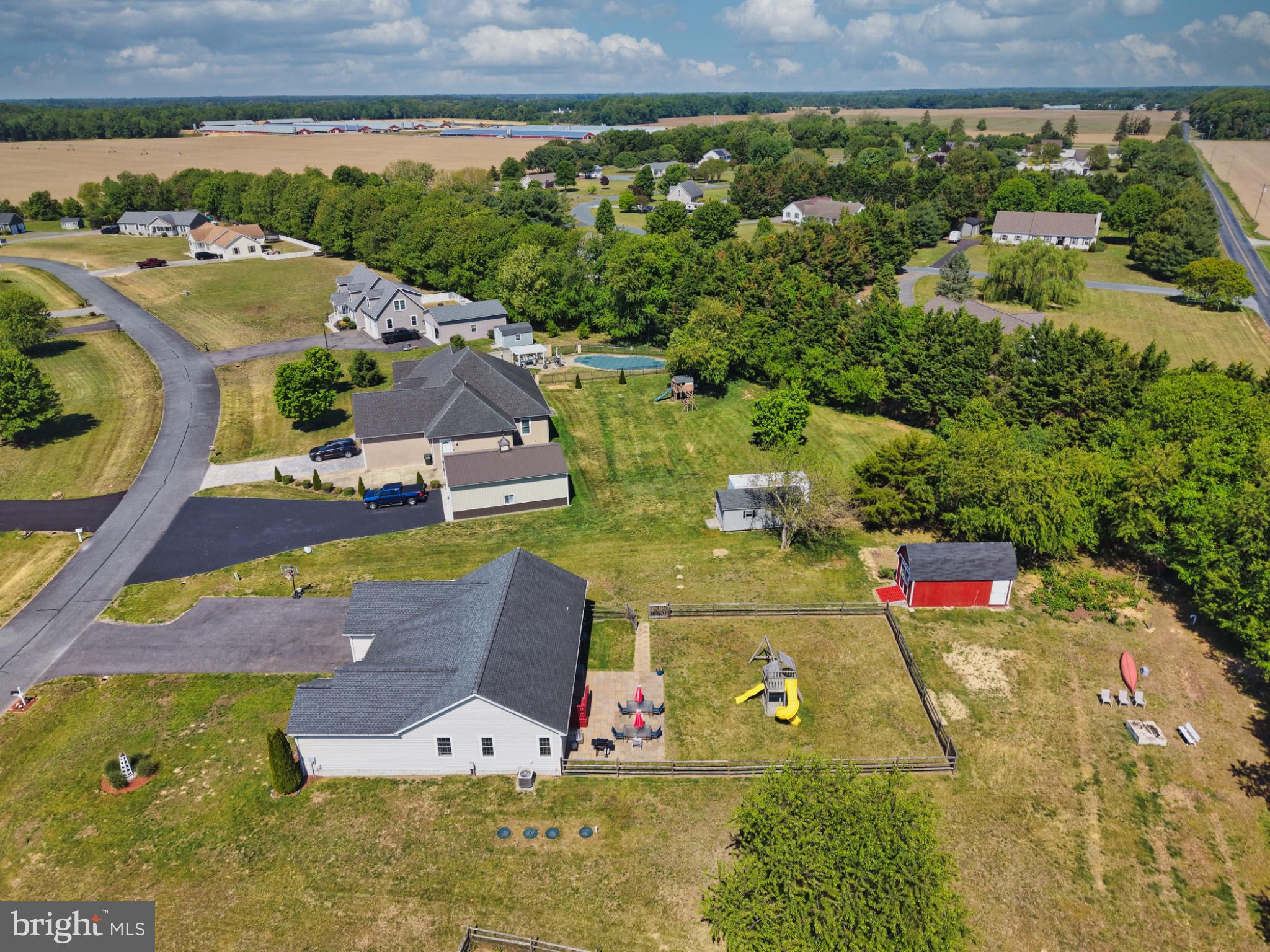23283 Magnolia Hills Road Denton, MD 21629 - Photo 52 of 54 an aerial view of a house with a yard