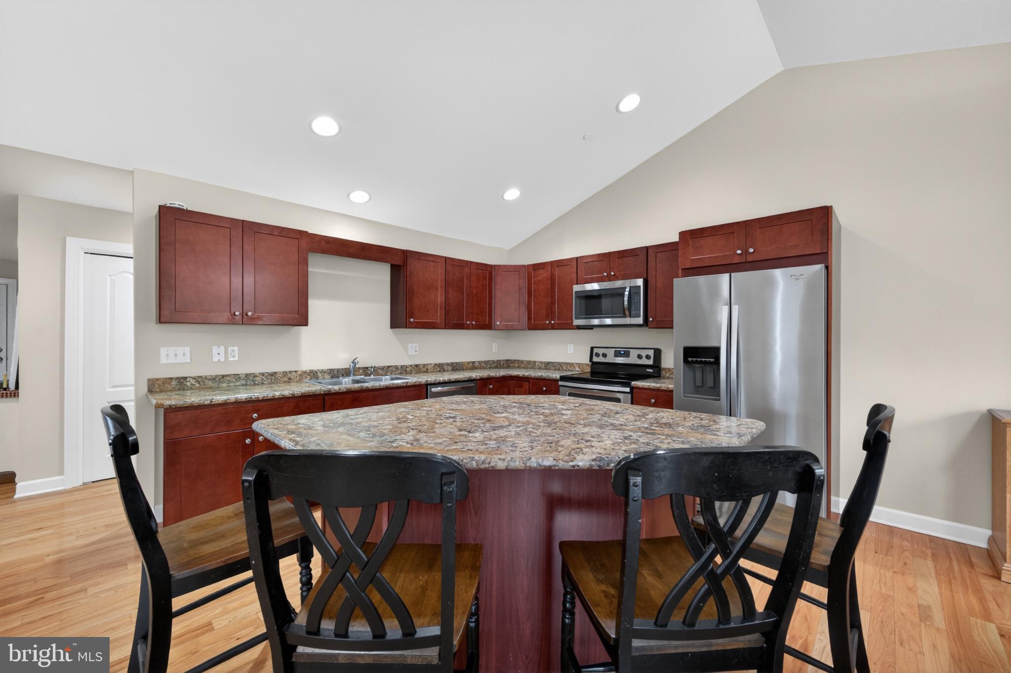 23283 Magnolia Hills Road Denton, MD 21629 - Photo 10 of 54 a view of a dining room with furniture