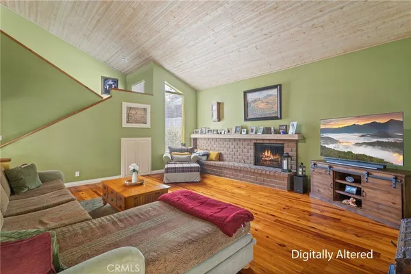a bedroom with furniture and a fireplace