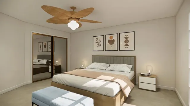 a bedroom with a bed and a chandelier