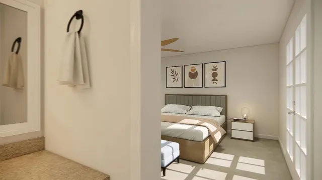 a bedroom with a bed and a window