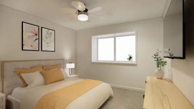 a bedroom with a bed and a window