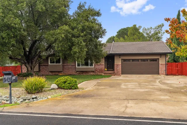 a house with yard in front of it