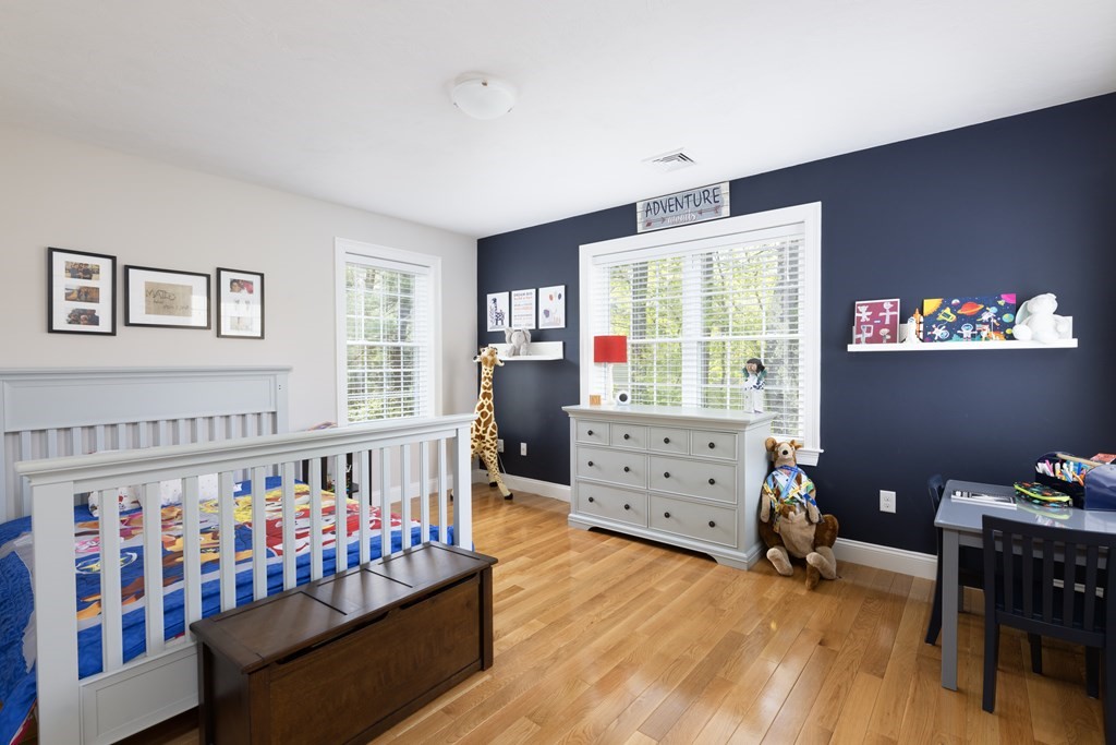 1 Pine House Road Millis, MA 02054 - Photo 16 of 33 a bedroom with furniture a baby crib and a window
