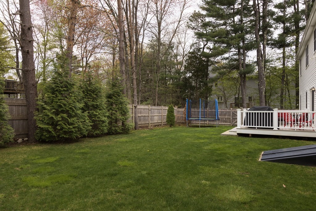 1 Pine House Road Millis, MA 02054 - Photo 27 of 33 a view of a chair and table and chairs in the garden