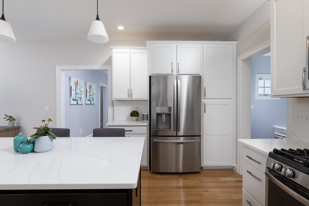 1 Pine House Road Millis, MA 02054 - Photo 7 of 33 a kitchen with kitchen island a refrigerator a stove a sink and a refrigerator