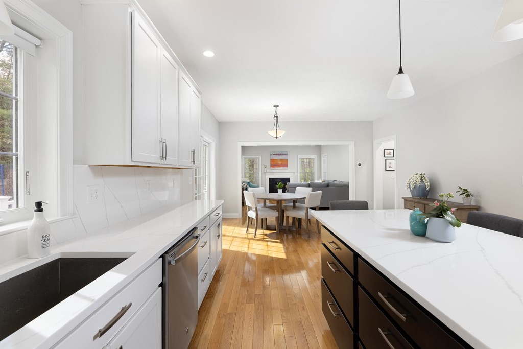 1 Pine House Road Millis, MA 02054 - Photo 8 of 33 a kitchen with lots of counter top space and living room