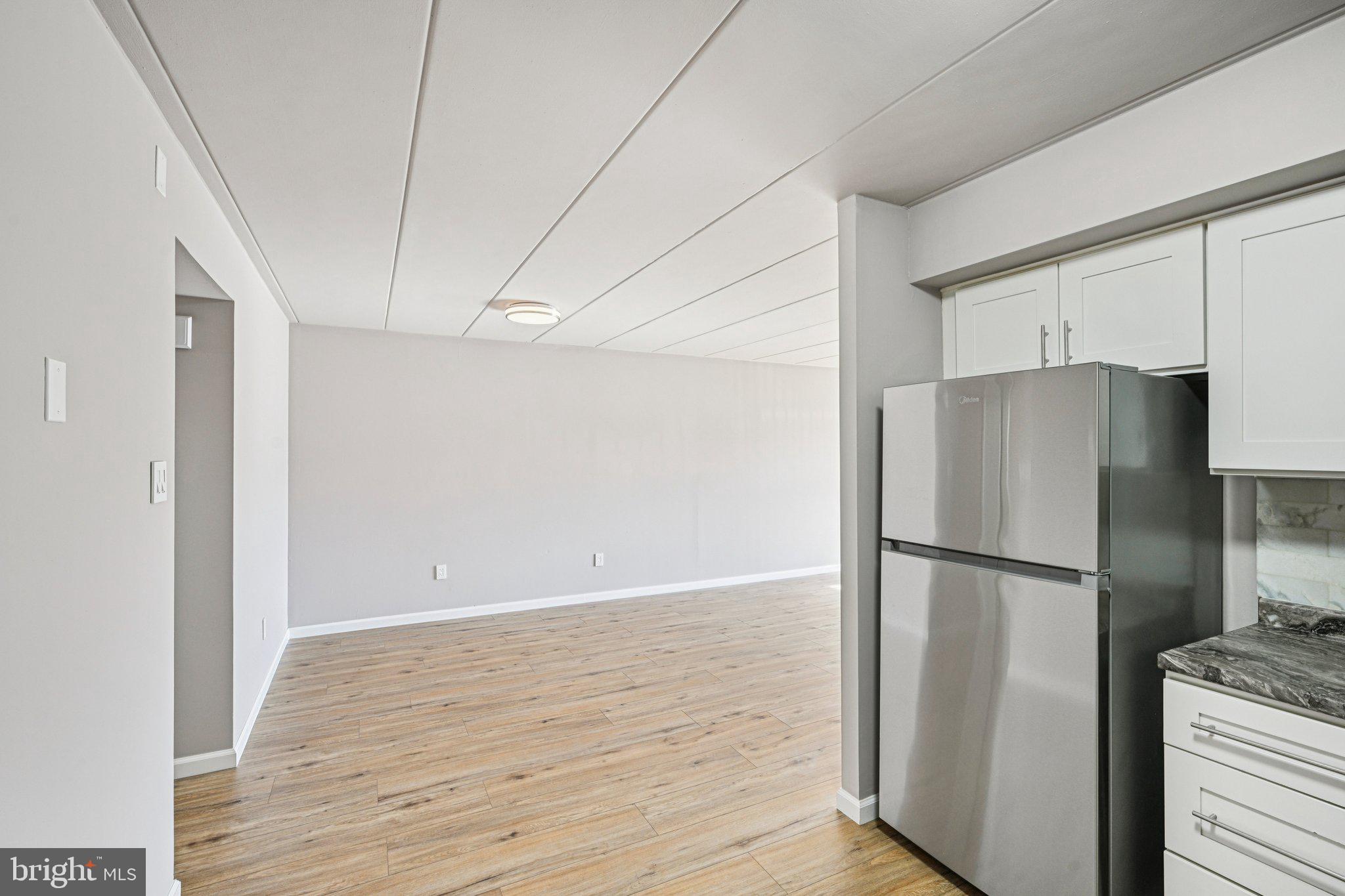 9906 Bustleton Avenue, Unit C25 Philadelphia, PA 19115 - Photo 11 of 26 a view of a kitchen with a refrigerator and a refrigerator