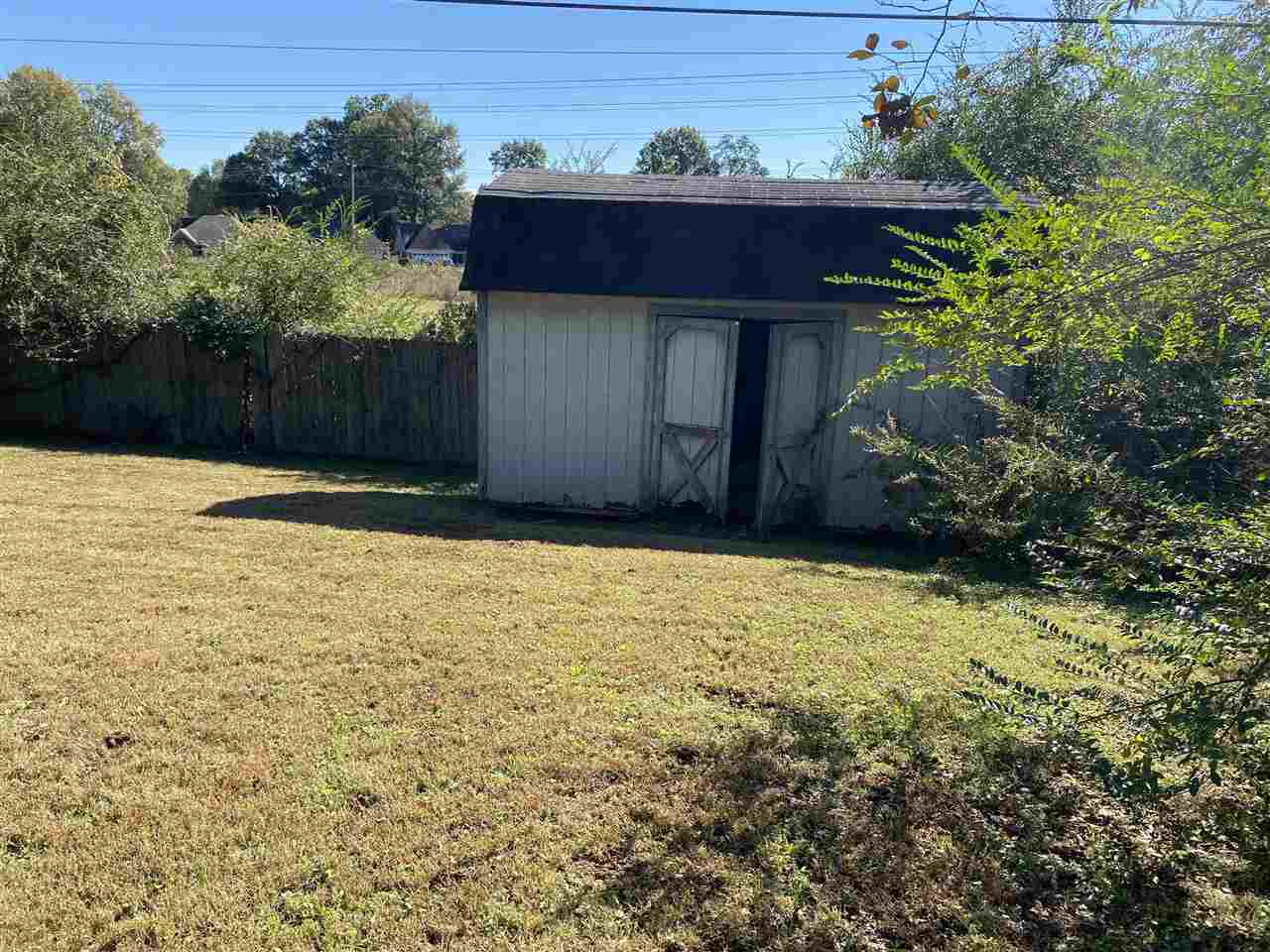 198 South Walnut Bend Road Memphis, TN 38018 - Photo 17 of 18 a view of a house with a yard