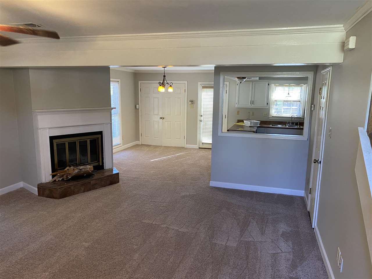 198 South Walnut Bend Road Memphis, TN 38018 - Photo 3 of 18 a living room with stainless steel appliances granite countertop furniture and a fireplace